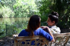 women sitting on a bench