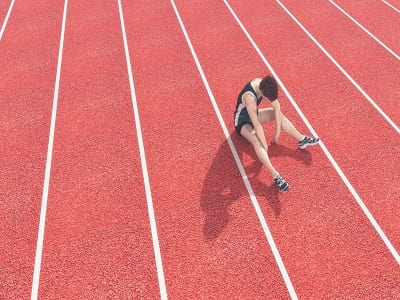 defeated athlete depicting addiction in sports