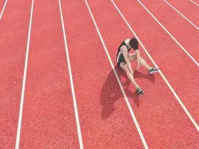 defeated athlete depicting addiction in sports