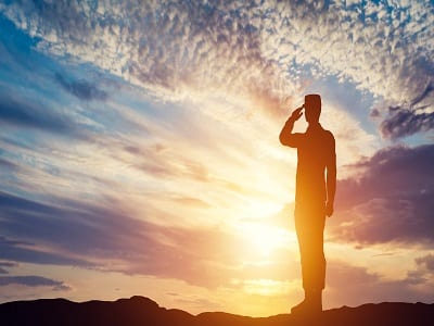 army veteran saluting