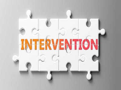 intervention written on puzzle pieces