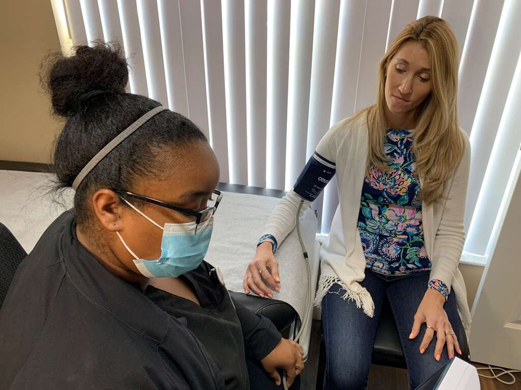 Detox Nurses Taking Blood Pressure | Turning Point of Tampa